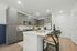 kitchen with large island and grey cabinets