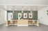 furnished leasing office with desk and chairs