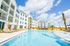 Pool and exterior of community on a sunny day