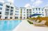 Pool and exterior of community on a sunny day