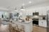 furnished kitchen with island and appliances