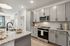 furnished kitchen area in apartment