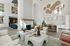 furnished clubroom with kitchen area and island