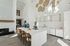 furnished clubroom with kitchen area and island