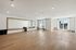 furnished fitness studio with large mirror