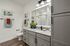 furnished bathroom with sink and toilet