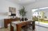 Furnished dining room with table and chairs
