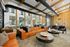 Furnished clubroom with couches and tables