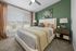 Furnished bedroom with bed