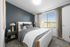 Furnished bedroom with bed