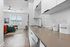 furnished kitchen area in studio apartment
