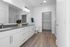 furnished bathroom with sink and closet