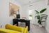 Furnished office with desk and chairs