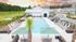 Community pool with lounge chairs