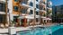 Chic apartment community with modern architecture and poolside cabanas.