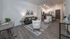 Stylish open-concept living room with contemporary furniture and elegant decor.