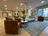 Inviting apartment lounge with modern seating, contemporary decor, and large windows.