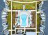 Aerial view of an upscale apartment complex featuring a stylish pool area with sun loungers and blue umbrellas, surrounded by neatly landscaped gardens.