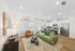 furnished living area and kitchen with luxury vinyl flooring