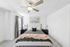 furnished bedroom with carpet