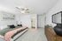 furnished bedroom and main bathroom