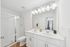 primary bathroom with dual vanity