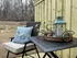 Back patio with chairs and a table