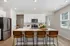 Kitchen with white cabinets and stainless steel appliances