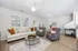 Living room with couch and chairs
