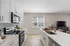 Kitchen with white cabinets and stainless steel appliances