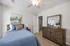 Guest bedroom with twin bed and dresser