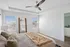 furnished bedroom with wood style flooring