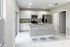 Bright and modern kitchen featuring sleek white cabinets, granite countertops, and stylish bar stools for an inviting atmosphere.