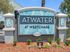 Welcoming entrance sign of Atwater at Westchase, featuring elegant blue and gray design accents.