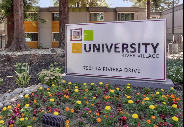 University River Village Sign